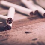 Cigarette smoke condensate attenuates